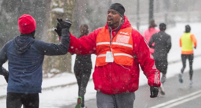 This volunteer, between miles 2&3 (and 5&6) was awesome and encouraging...